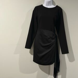 Black likely mini dress with long sleeves and fringe. Size 10 small